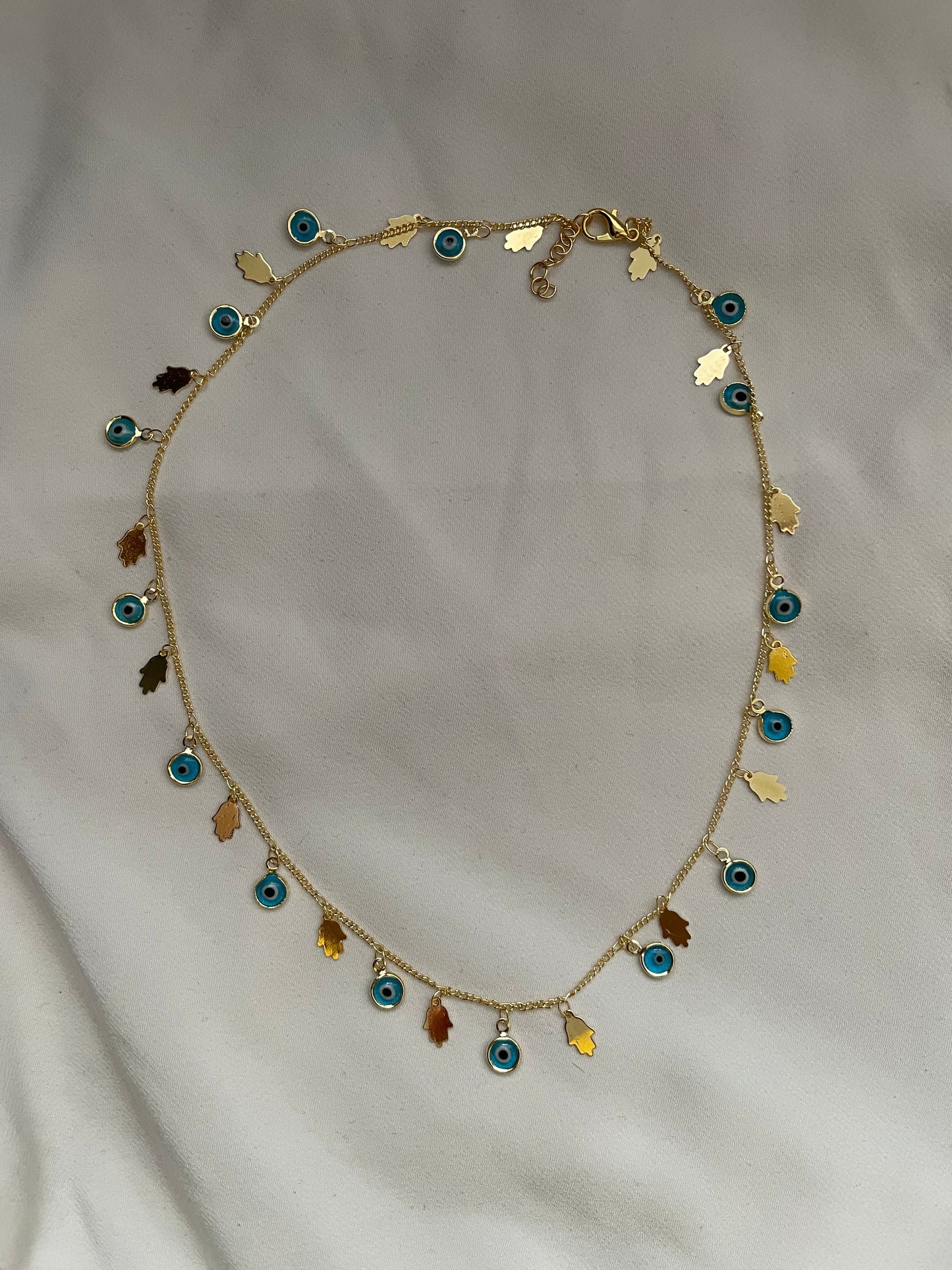 Nazar Halskette mit Hand von Fatima 18k vergoldet