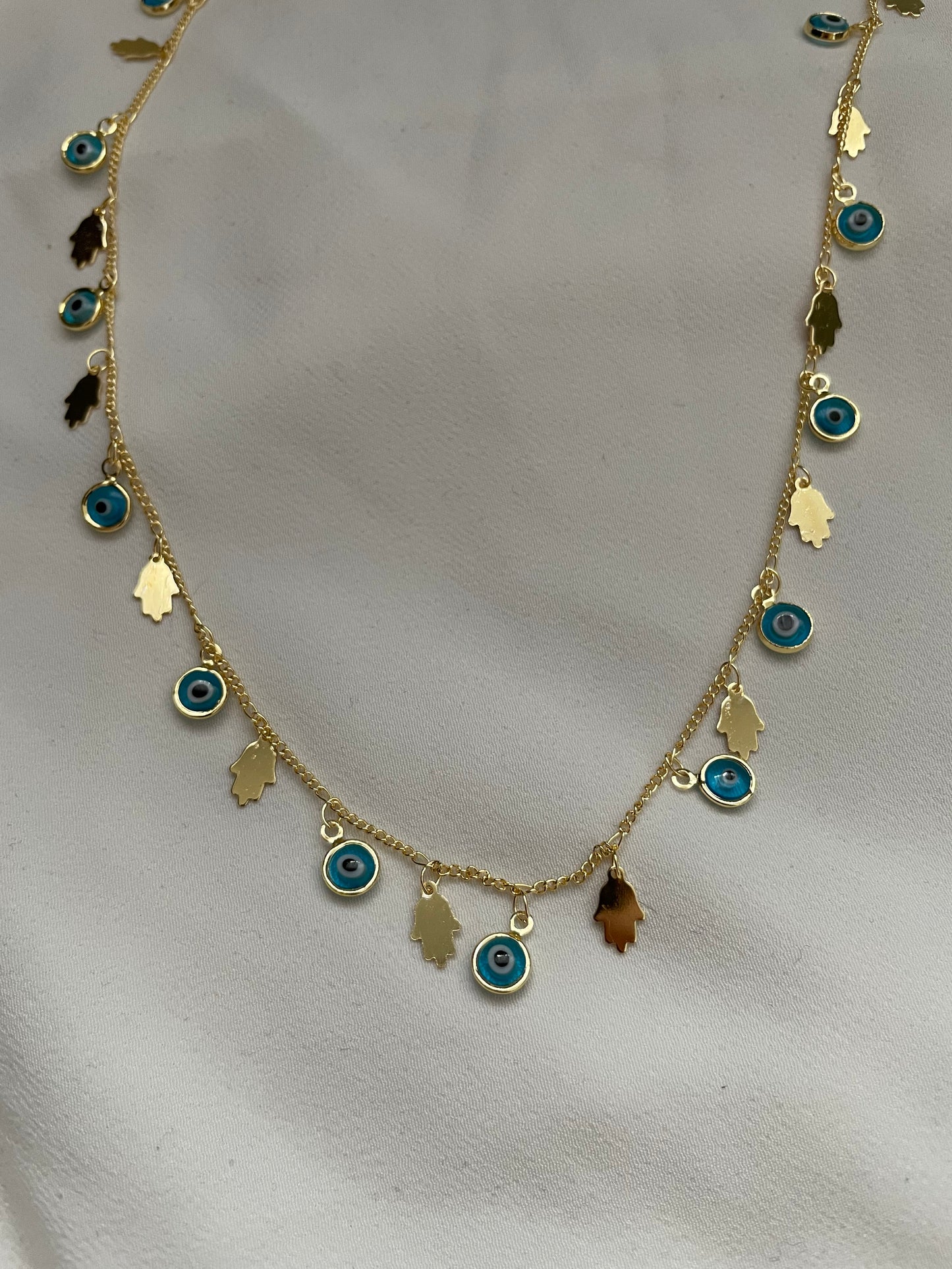 Nazar Halskette mit Hand von Fatima 18k vergoldet